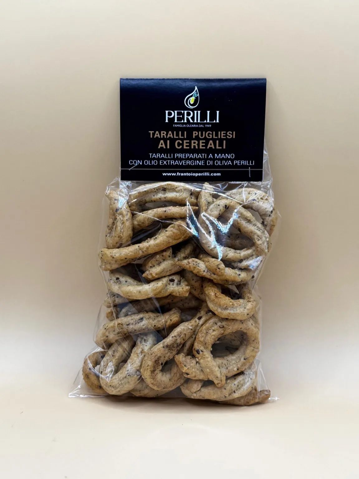 Taralli Pugliesi ai Cereali   preparati a mano con olio extravergine di oliva – 250g